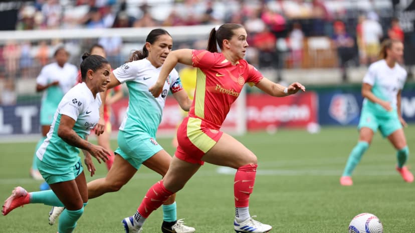  Jun 23, 2024: Sam Coffey (POR), Debinha (KC) and Lo'eau LaBonta (KC)
