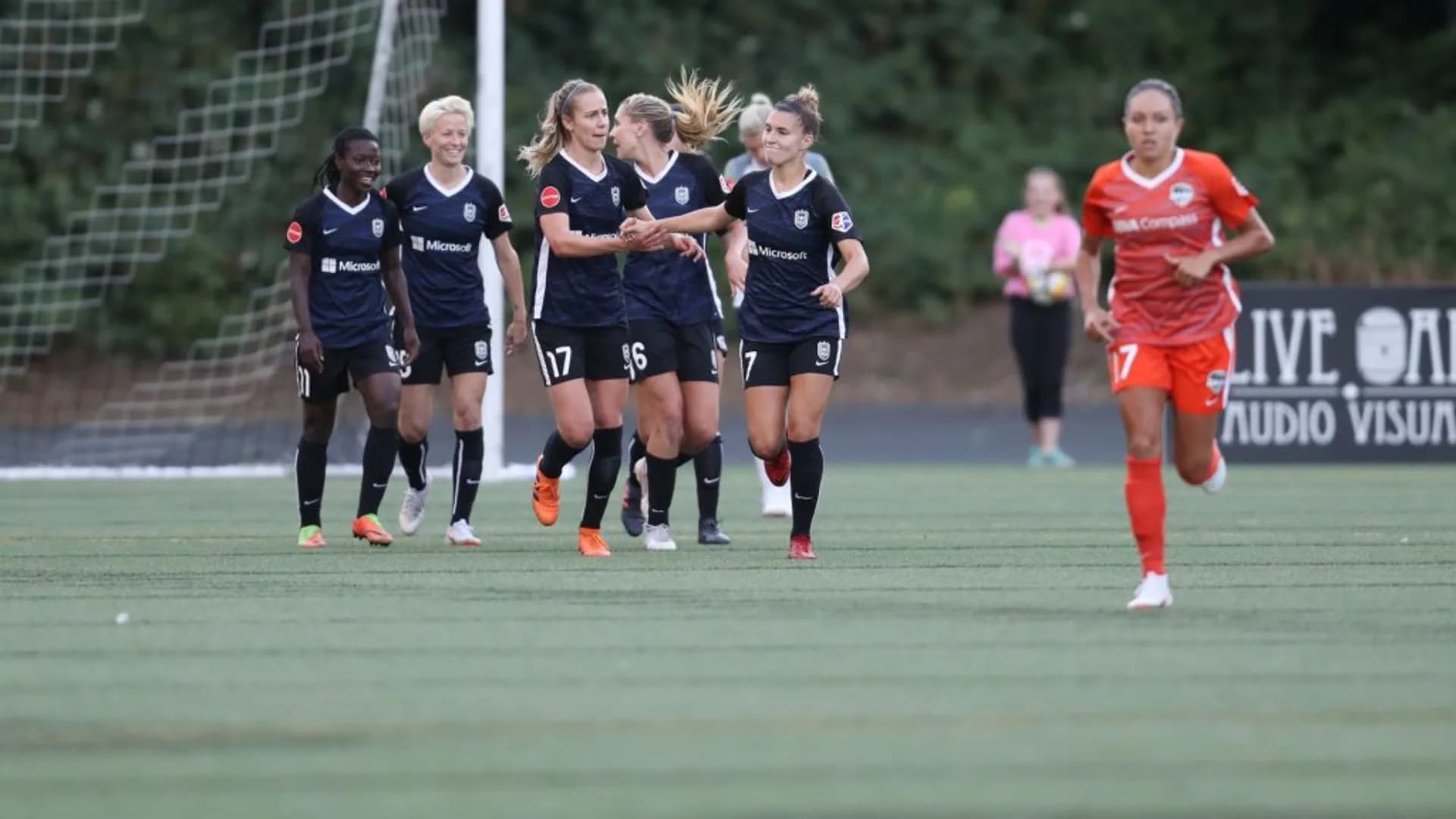 story-image-reign-fc-secure-second-place-taylor-rapinoe-and-long-score-in-3-1-win-over-dash