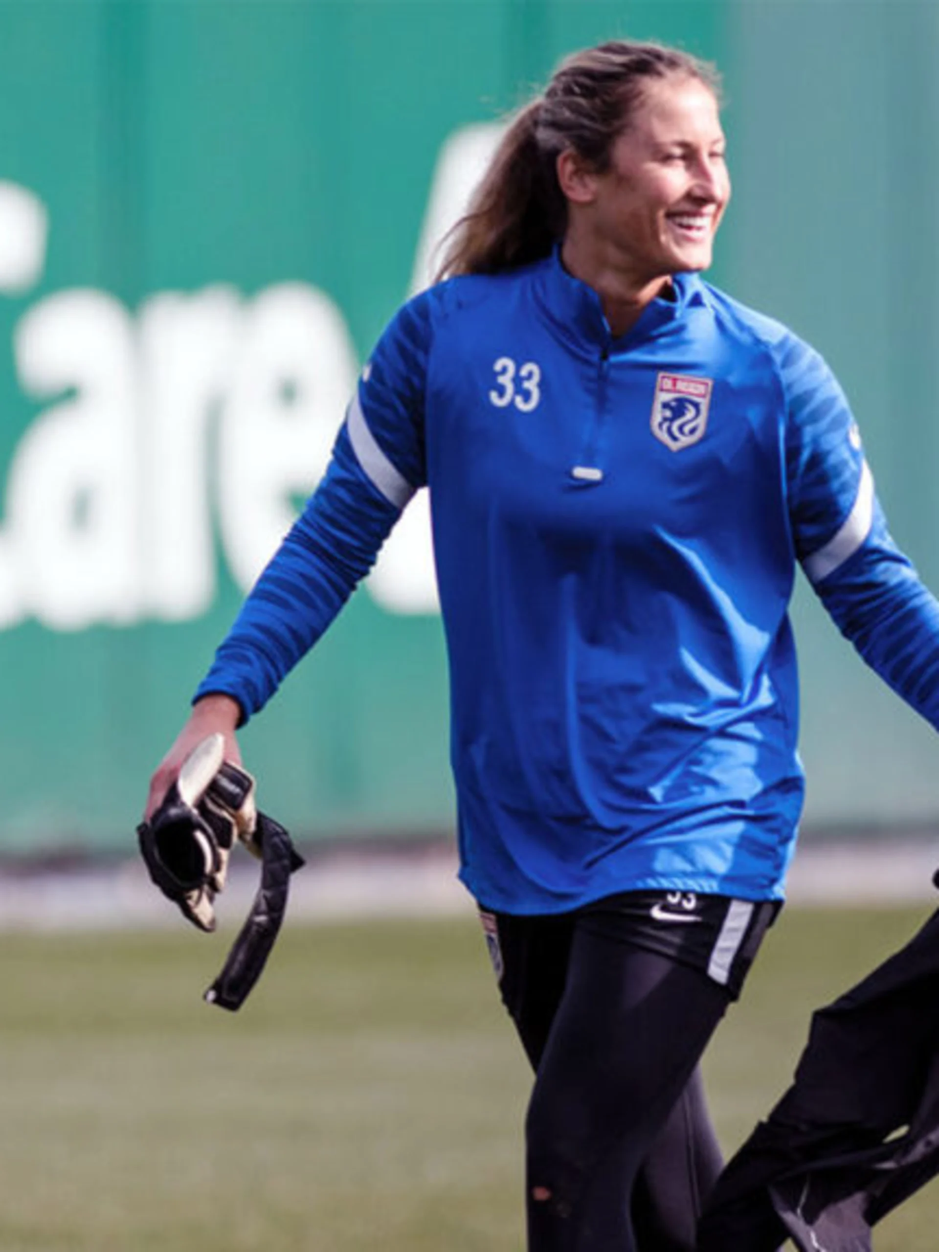 story-image-ol-reign-sign-forward-miranda-nild-and-goalkeeper-ella-dederick